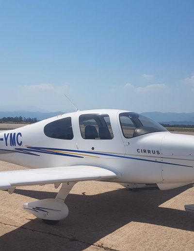 Cirrus SR20 Aircraft with mountains background PH-YMC